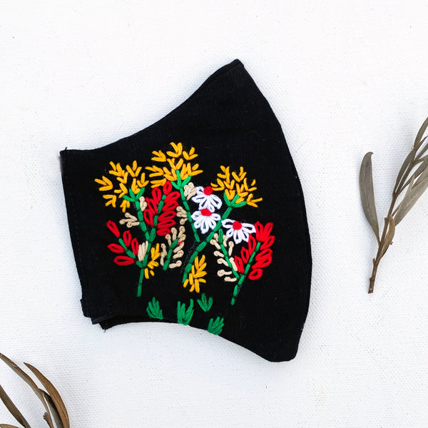 hand embroidered mask by Whistling Yarns